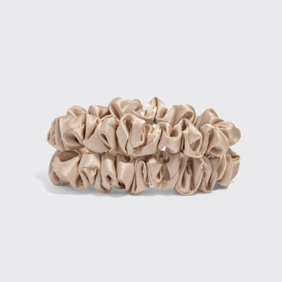 KITSCH Sweet & Silky Hair 4pc Set — two champagne satin scrunchies on a light gray backdrop — scrunchies provide gentle, snag-free hold for all hair types — the scrunchies' creaseless design helps protect hair from breakage