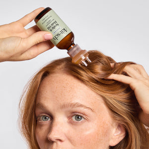 Model using the KITSCH Scalp Oil Applicator with Rosemary & Biotin Scalp & Hair Oil — delivers the perfect amount of product directly to scalp and roots