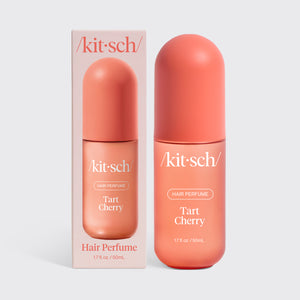 Kitsch Tart Cherry Hair & Body Perfume Mist bottle on a soft pink background