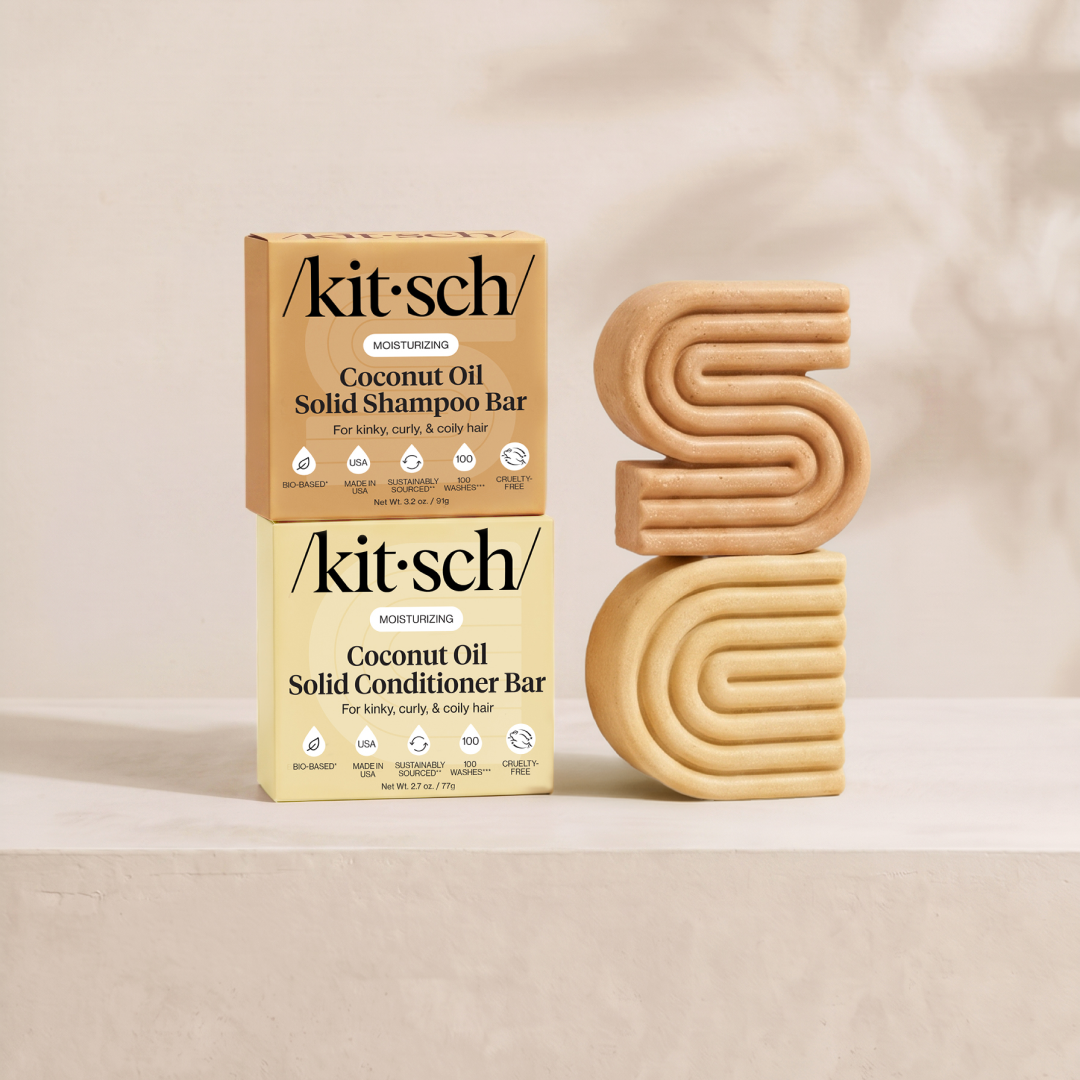 Kitsch Moisturizing Coconut Oil Solid Shampoo and Conditioner Bars shown side by side with retail packaging – deeply hydrates and adds shine for dry, damaged and frizzy hair